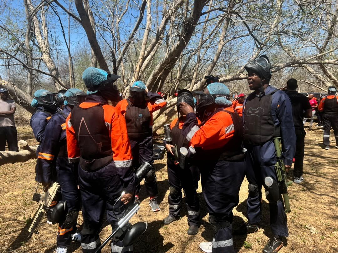 Players regrouping between rounds on the bush field during a large group game day